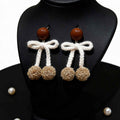Bow Pearl Drop Earrings